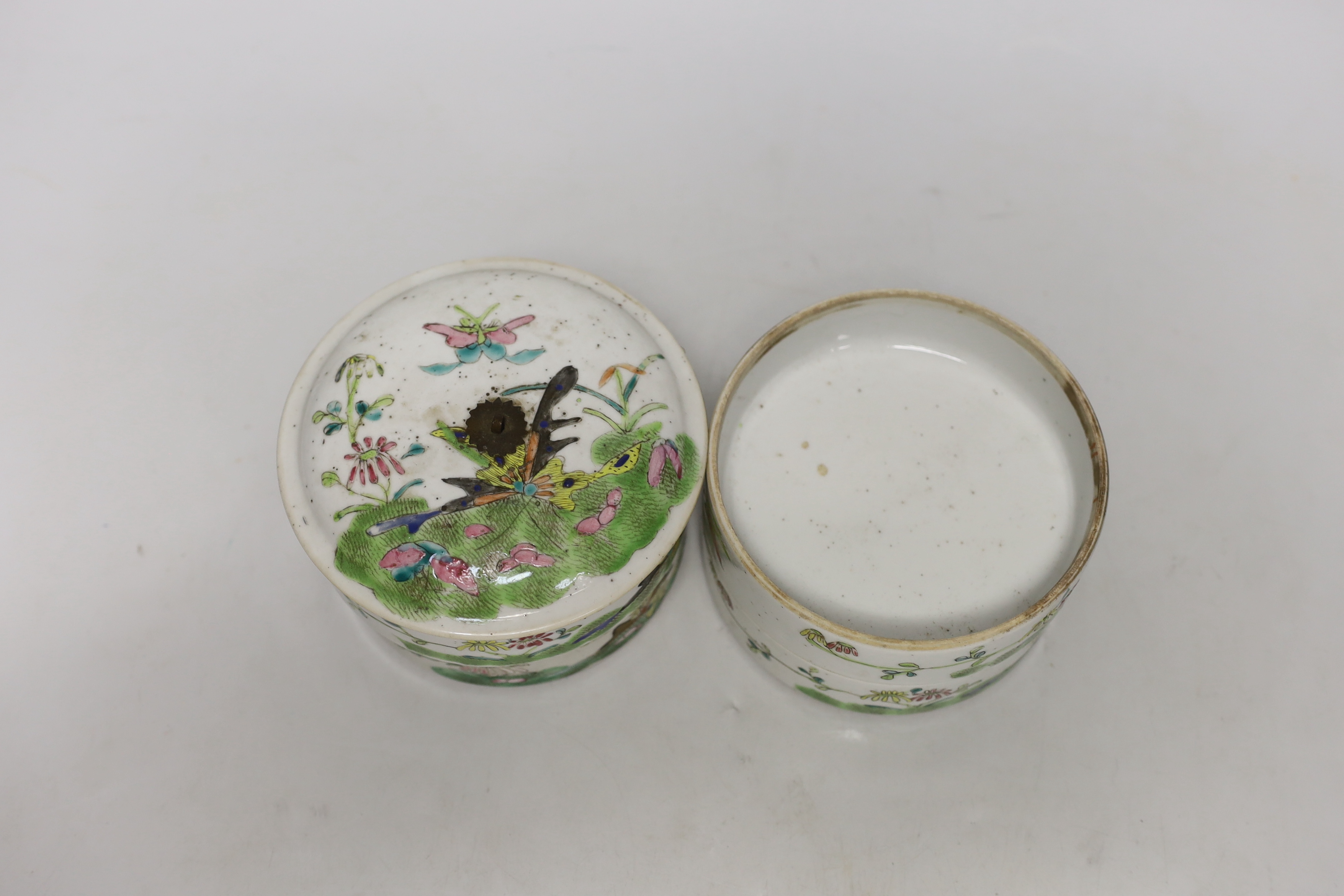 An early 20th century Chinese enamelled porcelain four section stacking food container and cover 14cm high